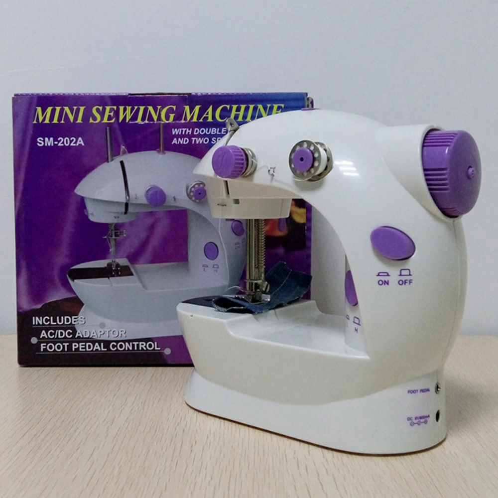 Mini machine à coudre électrique